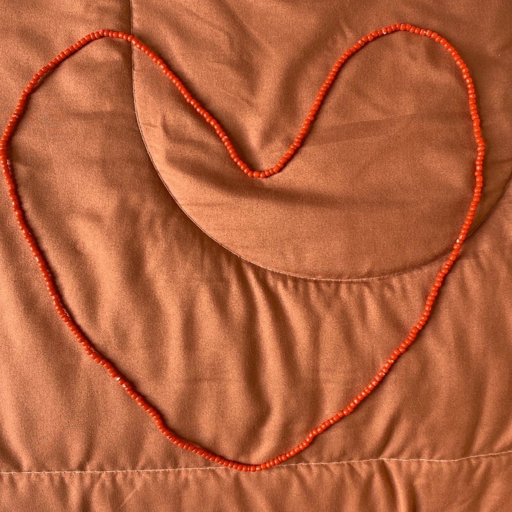 Small red waist bead